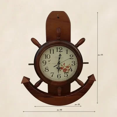ساعة حائط خشبية، قطر 26 سم، على هيئة هلب موديل 04808 أبعاد الساعة الخشبية على هيئة هلب. قطر= 26 سم، العرض= 40 سم والارتفاع= 55 سم