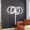 لمبادير LED عصري يتميز بستة حلقات دائرية متداخلة تنبعث منها إضاءة دافئة، مثالي لإضافة لمسة أنيقة وعصرية إلى ديكور المنزل.