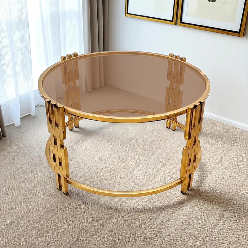ترابيزة قهوة أنيقة ستانلس ستيل ذهبي، سطح زجاجي دائري فيميه عسلي، تصميم عصري، ديكورات منزلية فاخرة
