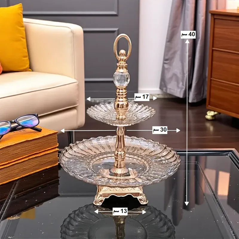 أبعاد شيالة الكريستال: الارتفاع الكلي 40 سم، قطر الطبق العلوي 17 سم والسفلي 30 سم، وأبعاد القاعدة 10*10 سم.