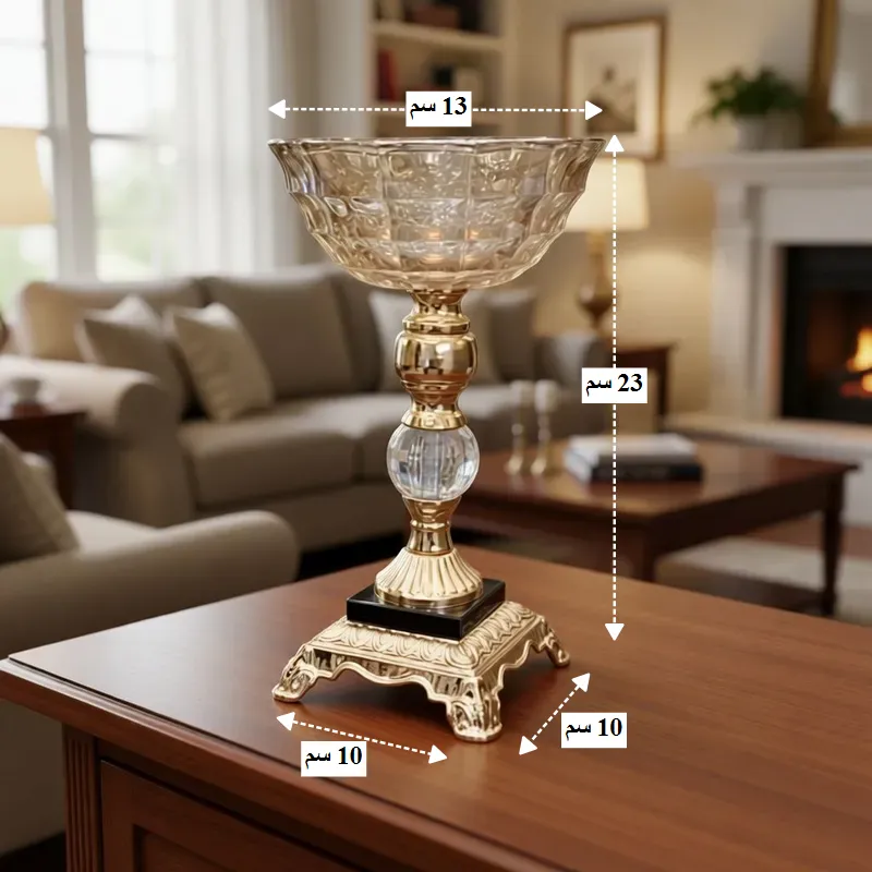 أبعاد حامل الشموع الذهبي: ارتفاع 23 سم، قطر 13 سم، قاعدة 10*10 سم