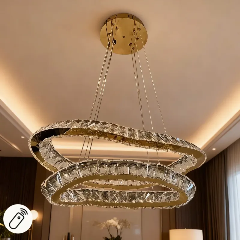 نجفة ليد فاخرة بتصميم حلقتين كريستال باللون الذهبي مع ريموت كونترول في غرفة معيشة عصرية