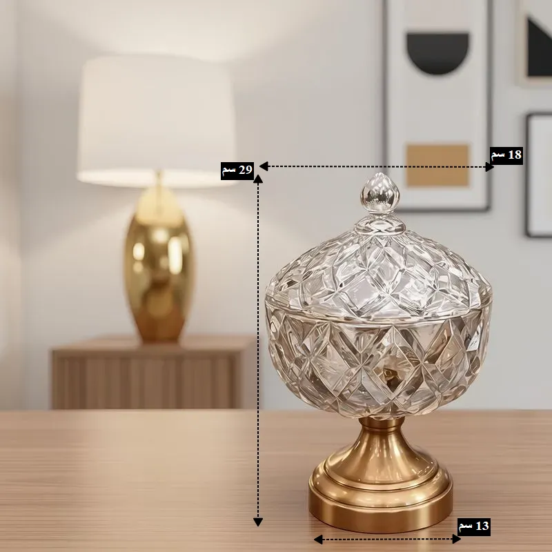 أبعاد بونبونيرة كريستال: الارتفاع الإجمالي: 29 سم (من القاعدة وحتى قمة الغطاء). قطر الوعاء الكريستالي: 18 سم. قطر القاعدة الذهبية: 13 سم.