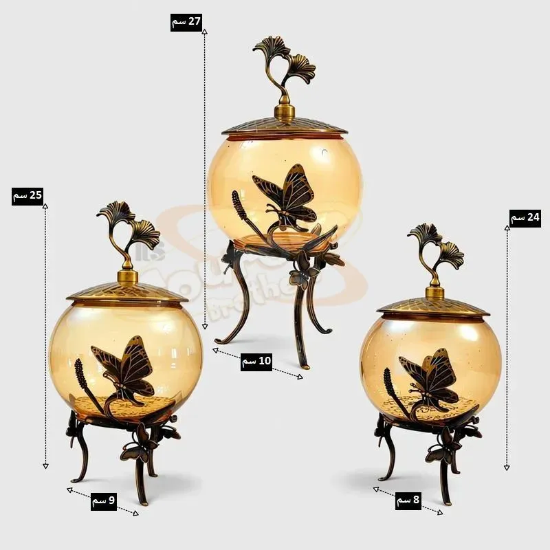 طقم بونبونيرة زجاجي عسلي فاخر 3 قطع - بتصميم الفراشة، موديل 030531 مقاسات وأبعاد طقم البونبونيرة الزجاجي: الكبرى 10*27 سم والوسطى 9*25 سم والأصغر 8*24 سم