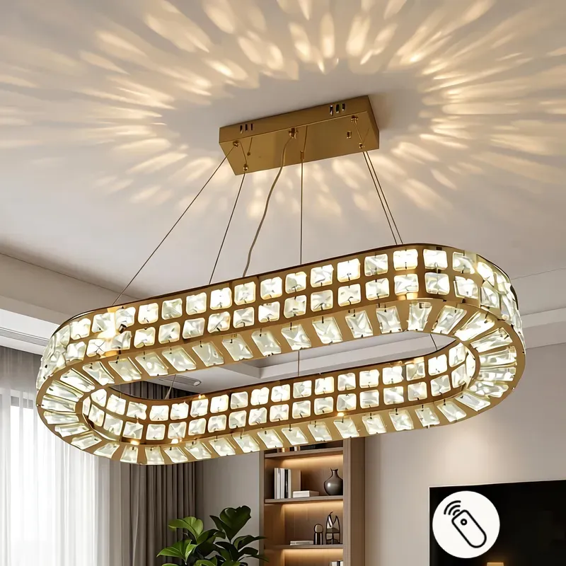 نجفة ليد (LED) بيضاوية مودرن بتصميم إطار الكريستال الملكي - إضاءة ذكية 3 ألوان مع ريموت كنترول وخاصية تعتيم، موديل 030598 نجفة ليد كريستال ذهبية بيضاوية مودرن بإضاءة ثلاثية وريموت كنترول.