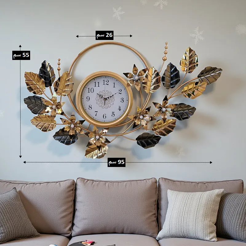 ساعة حائط معدنية مودرن بتصميم أوراق الشجر الذهبية والسوداء - 95 سم، موديل 030142 أبعاد ساعة الحائط المعدنية بعرض 95 سم وارتفاع 55 سم وقطر ساعة 26 سم.