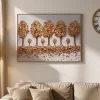 تابلوه حائط ثلاثي الأبعاد بتصميم أشجار ذهبية معلق أسفل ساعة حائط وفوق أريكة مودرن بإضاءة طبيعية دافئة.