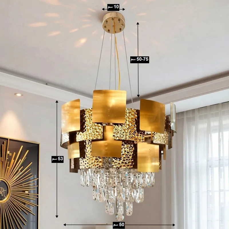 نجفة مودرن فاخرة باللون الذهبي مع كريستال متدلي وتصميم معدني هندسي، قطر 50 سم، موديل 026563 مخطط يوضح مقاسات النجفة: القطر الكلي: 50 سم. ارتفاع جسم النجفة: 53 سم. قطر قاعدة السقف: 10 سم. طول سلك التعليق: يتراوح بين 50 إلى 75 سم (قابل للتعديل).