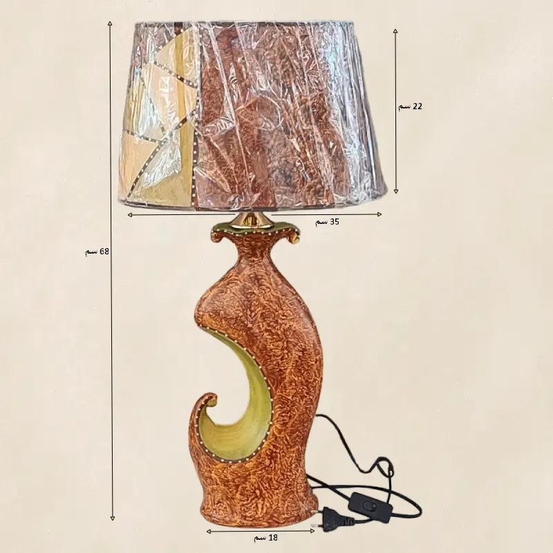 أبعاد الأباجورة القياسية. عرض القاعدة= 18 سم والارتفاع الكلي= 68 سم. عرض الغطاء=35 سم وارتفاع الغطاء= 22 سم