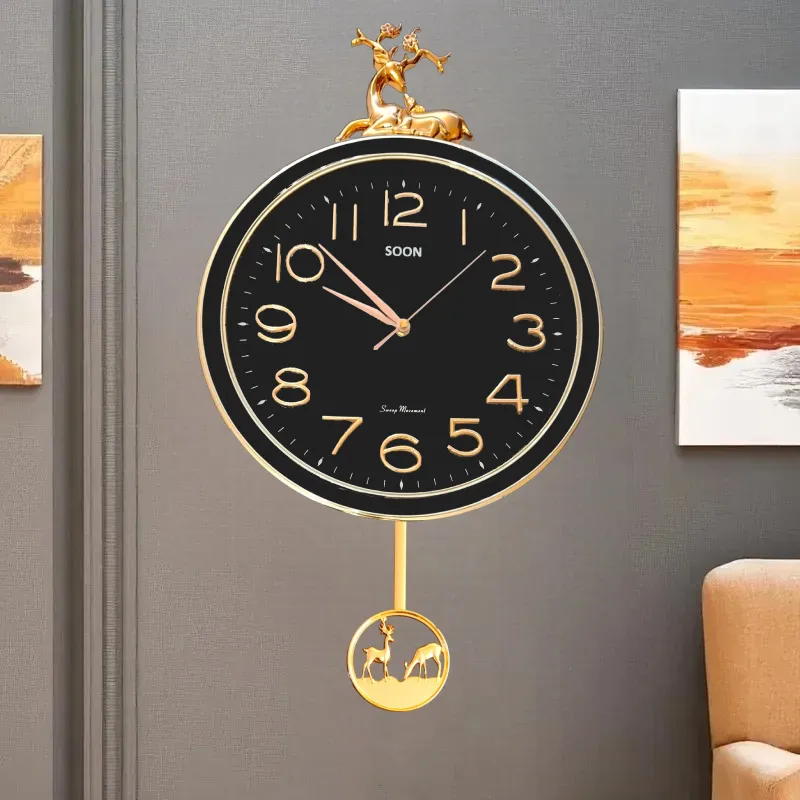 ساعة حائط بندول بتصميم عصري فاخر باللون الرمادي ولمسات ذهبية أنيقة مع بندول بشكل غزال.